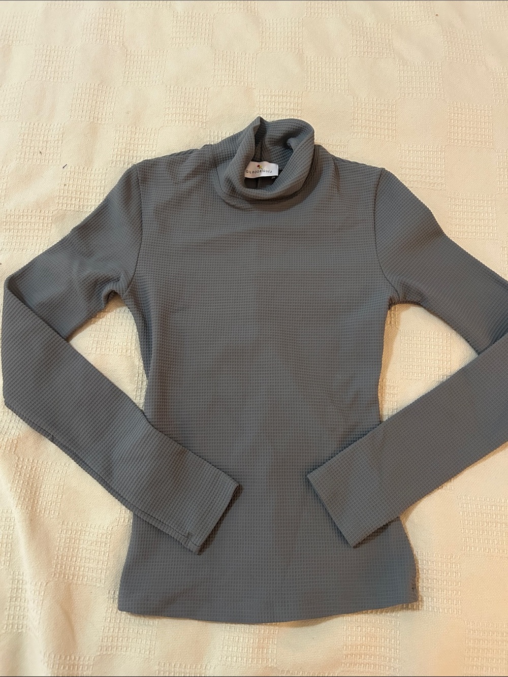 Gil Rodriguez, gray thermal turtleneck small but fits like an extra small